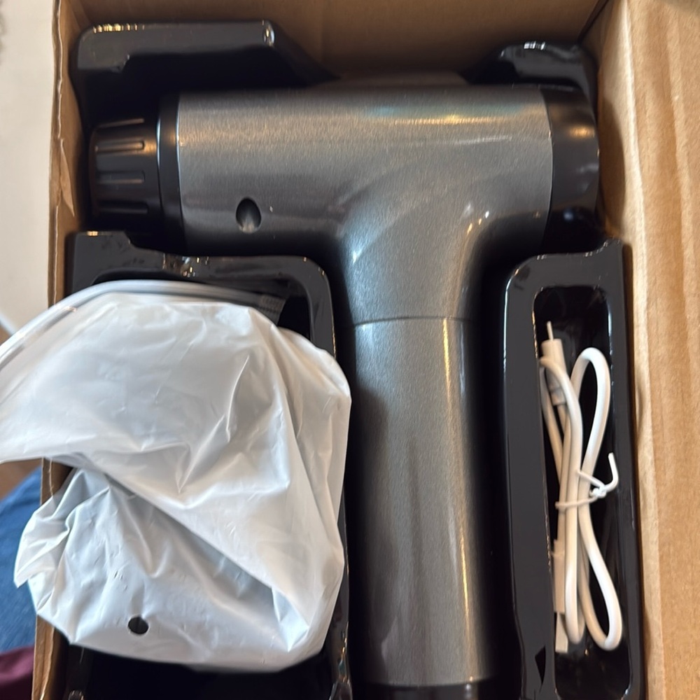 Sleek Black and Gray Massage Gun